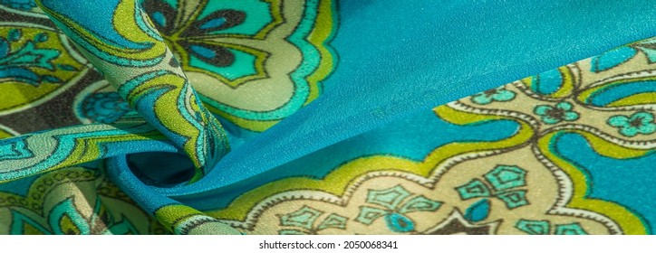 tela de seda multicolor con un patrón de patrones sobre un fondo verde, patrón real. Tendencias de Versalles. patrón jacquard. fondo de textura