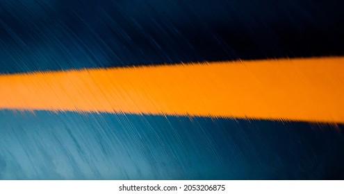 青とオレンジ色の紙のテクスチャ背景。テクスチャ背景をぼかします。テキストのための場所。三音。抽象的な雨の線。