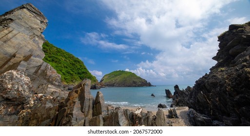 Beautiful bay with natural rocks and blue sea and blue sky