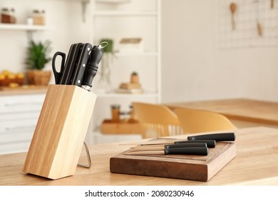 Set of knives on table in kitchen