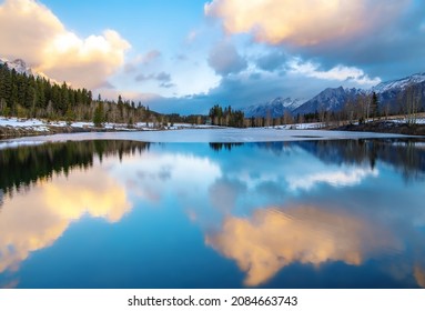 Panoramic reflections on Quarry lake at sunrise