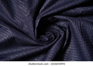 close-up textuur blauwe stof van pak, fotoshoot op scherptediepte voor object
