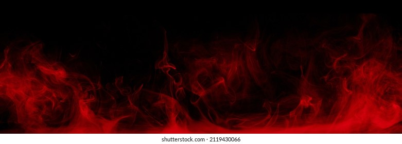 Panoramic view of the abstract fog. Red cloudiness, mist or smog moves on black background. Beautiful swirling smoke. Mockup for your logo. Wide angle horizontal wallpaper or web banner.