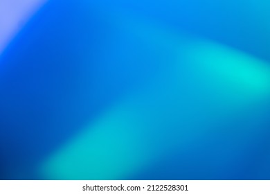 Luce al neon sfocata. Sfondo iridescente. Illuminazione a LED ultravioletta. Effetto di macchie di bagliore sfumate di colore blu-verde sfocato strato astratto.