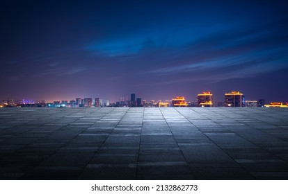 Night view of the city in front of the square