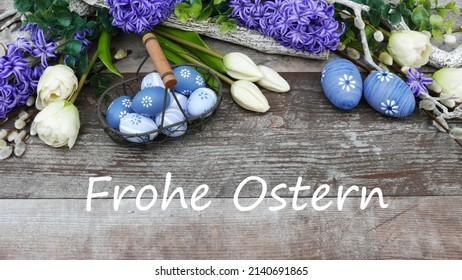 Paasdecoratie met de Duitse tekst Frohe Ostern, Frohe Ostern vertaalt naar Vrolijk Pasen.