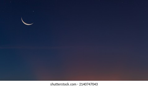 Crescent moon on dusk sky Twilight after sundown free space for text, Religion off Islamic on ramadan month, Eid Al Adha, Eid Al Fitr, Muharram 