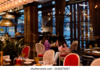 Blurred coffee shop or restraunt interior background.