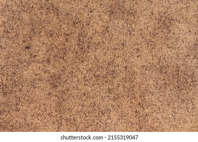 Fondo grueso de una hoja de papel artesanal marrón sombreada con grafito y carbón