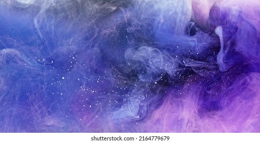 Ink water mix motion. Color mist flow. Neon purple blue fume moving on abstract art background shot on Red Cinema camera 6k.