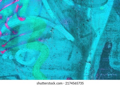Closeup of colorful teal, pink and blue urban wall texture. Modern pattern for wallpaper design. Creative modern urban city background for advertising mockups. Grunge messy street style background