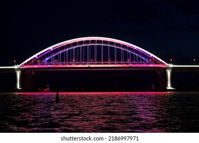 Seascape with a view of the illumination of the Crimean Bridge, Russia