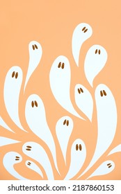 Halloween trendy design, group of cute white ghosts flying on pastel orange color background.