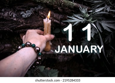 kalenderdatum op de achtergrond van een esoterisch spiritueel ritueel. 11 januari is de elfde dag van de maand.