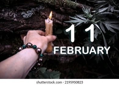 kalenderdatum op de achtergrond van een esoterisch spiritueel ritueel. 11 februari is de elfde dag van de maand.