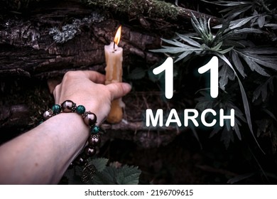 kalenderdatum op de achtergrond van een esoterisch spiritueel ritueel. 11 maart is de elfde dag van de maand.