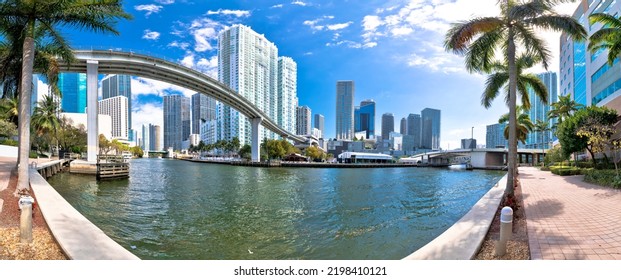 Miami downtown skyline and futuristic mover train above Miami river panoramic view, Florida state, United States of America
