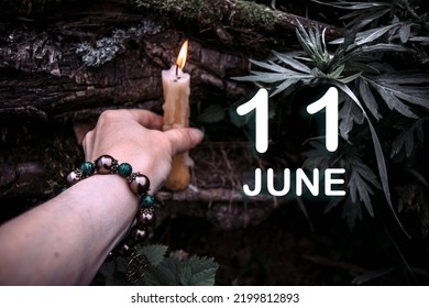 kalenderdatum op de achtergrond van een esoterisch spiritueel ritueel. 11 juni is de elfde dag van de maand.