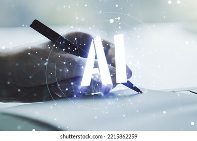 Creative artificial Intelligence symbol concept with man hand writing in notebook on background. Multiexposure