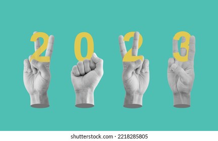 デジタルコラージュ、2023年新年のハンドサイン。2023年の新年を示す手