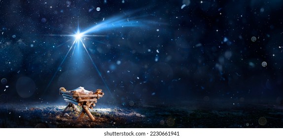 Presépio - Nascimento de Jesus Cristo com manjedoura em noite de neve e céu estrelado - Fundo desfocado abstrato