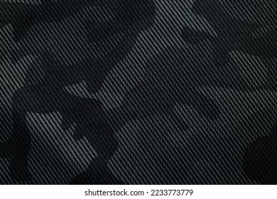 Motif camouflage. Tissu camouflage gris foncé tendance. Texture militaire. Fond sombre.