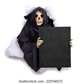Grim Reaper with an billboard. The Grim Reaper is peering from a hole in the wall and holding a blackboard. Skeleton showing a blank poster. Grim reaper through the hole shows blank poster.