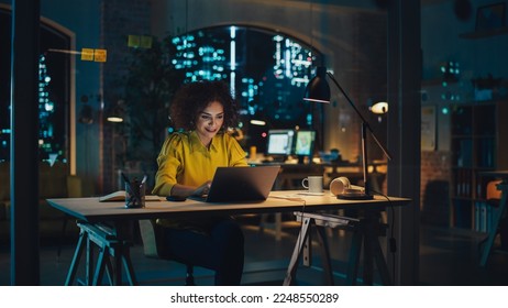 Point of View from Camera with Beautiful Multiethnic Arab Project Manager Making a Video Call from Office at Night. Female Specialist Talking to Colleague Over a Live Camera and Taking Notes