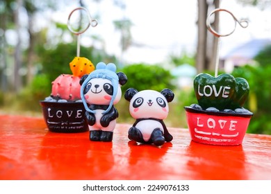The cuteness of panda bears in the festival of love  Valentine's Day  clear image after blur