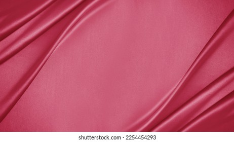 Raso di seta rosso rosa. Colore magenta Viva. Tendenza 2023. Tessuto drappeggiato. Sfondo elegante con spazio per il design. Vista dall'alto, in piano. Modello. San Valentino, festa della mamma, compleanno, romantico.
