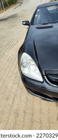 Lampu depan mobil mata kucing
