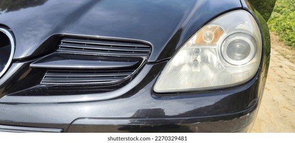 Lampu depan mobil mata kucing