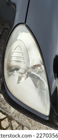 Lampu depan mobil mata kucing