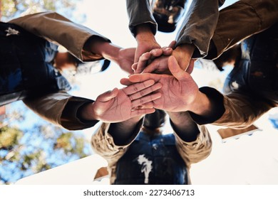 Goals, paintball team or hands in huddle for strategy, hope or soldier training on war battlefield. Mission, low angle or army people planning with support in partnership or military group solidarity