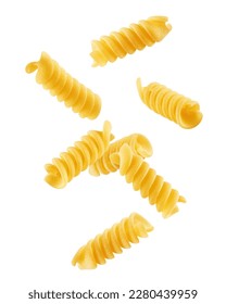 Falling raw Fusilli, Rotini, uncooked Italian Pasta, isolated on white background, clipping path, full depth of field