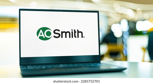 Logo of public company A.O. Smith Corp displayed on a smartphone. Grey  background. Credit: PIXDUCE Stock Photo - Alamy