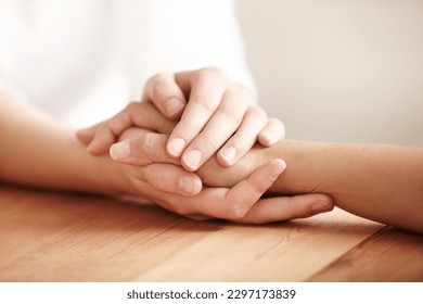 Holding hands, support and people with care for friends, showing empathy and love with kindness. Comfort, hope and a person giving a helping hand for mental health, trust and forgiveness together