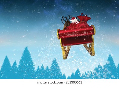 Santa volando su trineo contra el bosque de abetos