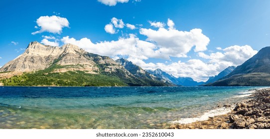 Vimy Peak, Mount Boswell, Mount Cleveland, as viewed from the shore of Upper Waterton Lake, in Waterton Park, Waterton Lakes National Park, Alberta, Canada