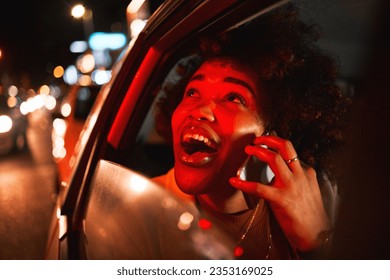 Happy black woman, phone call and car at night in city for communication, conversation or outdoor networking. African female person smile in travel or late evening on mobile smartphone in town street