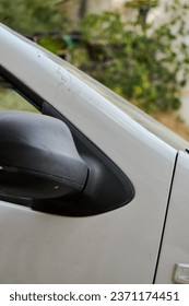 A part of a car in the street