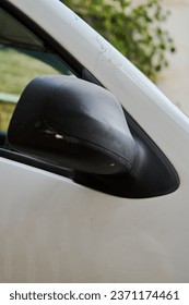 A part of a car in the street