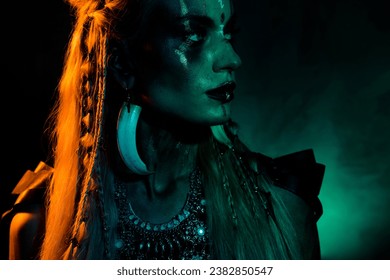 Photo of attractive cool mysterious lady wear viking clothes copyspace empty space isolated dark color background
