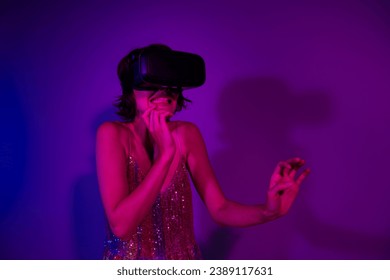 Photo of lady player gamer using vr box see illusion in thriller horror game isolated bright neon color background