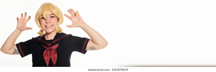 cute anime woman in school uniform and wig showing frightening gesture on white, horizontal banner