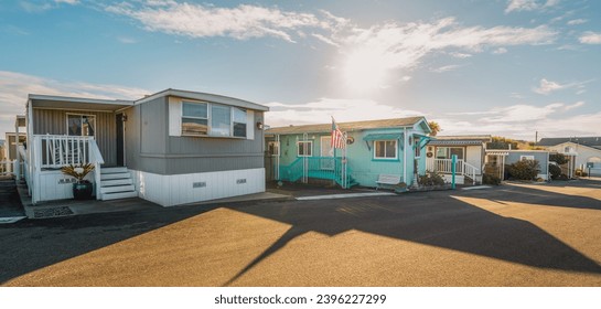 Mobile home park. A row of residential mobile park homes in a small town somewhere in California. Lifestyle, architecture, street view
