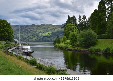 Pleasure boats docked in Fort Augustus ready to sail on Loch Ness lake