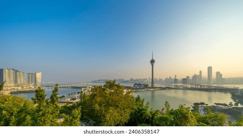 Macau Sunset view city skyline and Macau Tower Convention and Entertainment Center at Macao