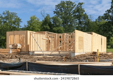 frame of a new plywood house construction limber plank wooden