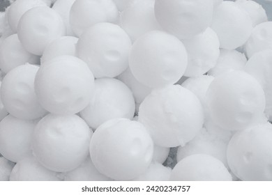 A heap of snowballs closeup. Winter background texture